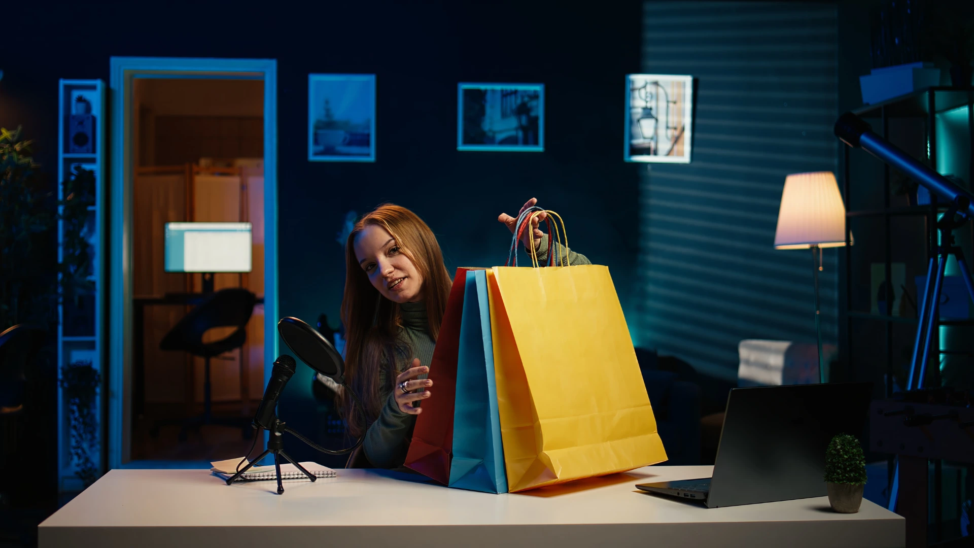 Content creator presenting colorful gift bags on camera, representing interactive virtual swag bag ideas for attendees.