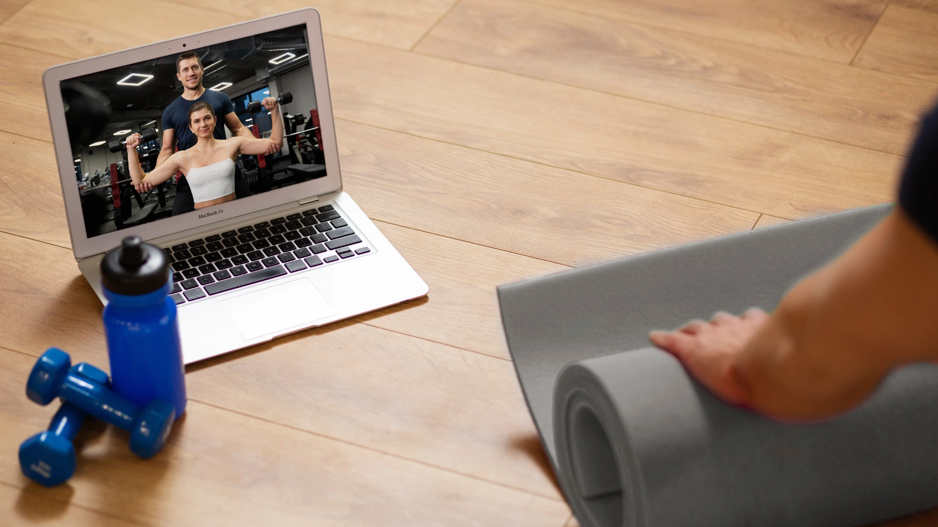 Laptop showing an online workout session, representing virtual swag bag ideas like fitness and wellness passes.