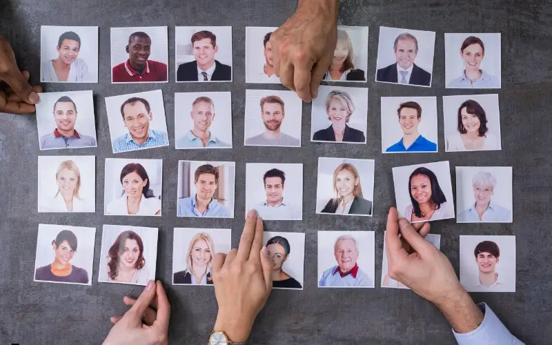 Recruiters reviewing candidate profiles and shortlisting potential matches during pre-screening.