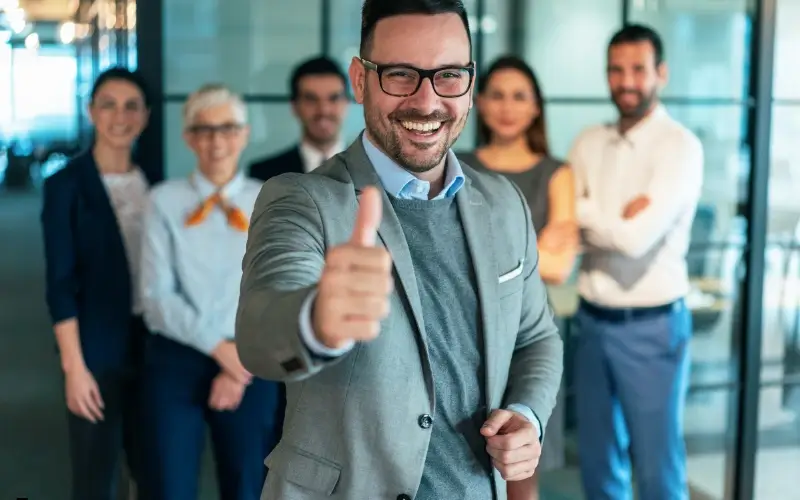 Recruiter confirming successful hiring outcome after post-event follow-up.