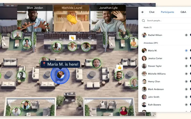 View of a Remo interactive floor plan layout with customizable tables alongside a video chat grid.
