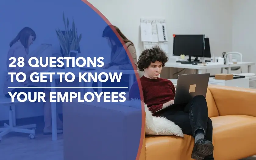 Remote employee working on a laptop from a couch in a modern office lounge.