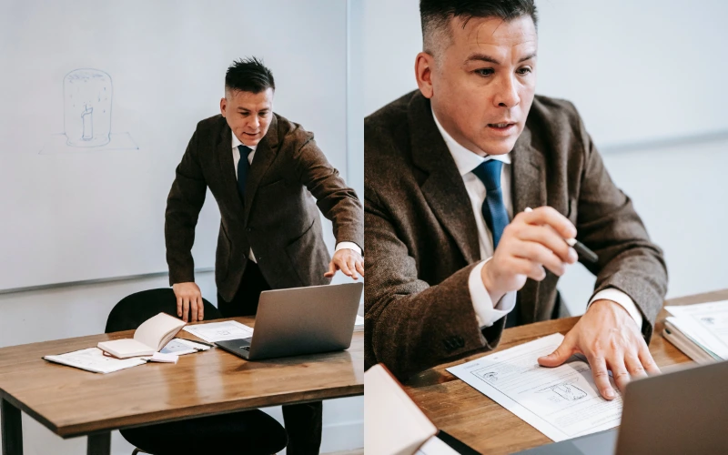 Business professional delivering an online training session from a laptop and presentation materials.