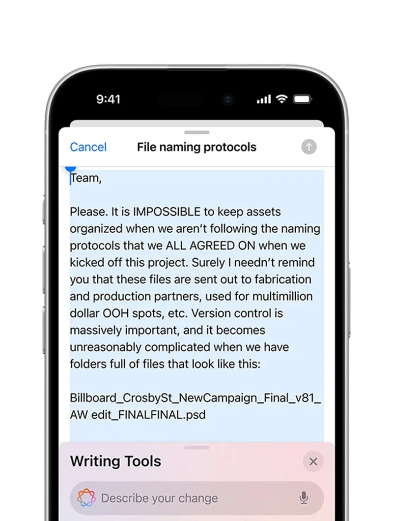 An iPhone showing AI making suggestions to an email.