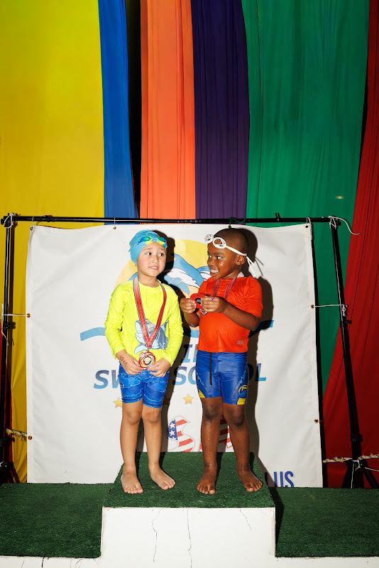 Swimmers on the awards podium