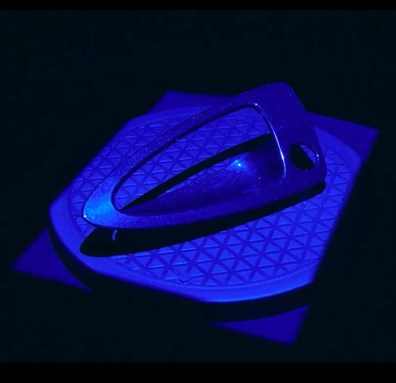 Blue light scanning a car part
