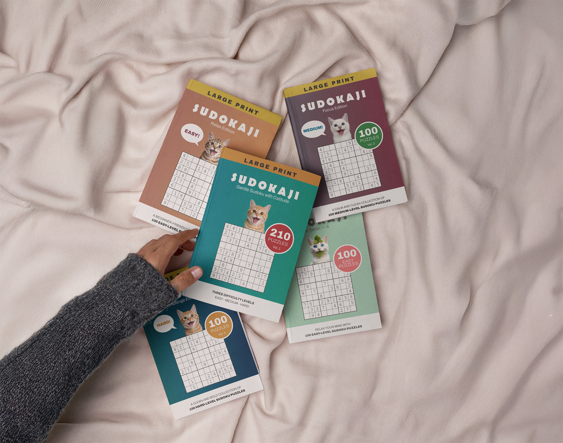 Books from the Sudoku series Sudokaji lying on the floor