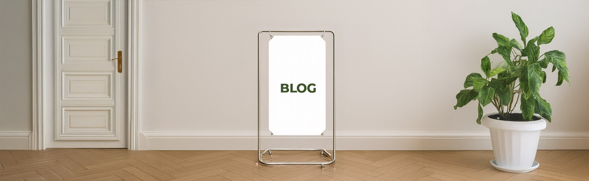 A blue notebook, a pen, a graphic tablet and a printed document on white surface