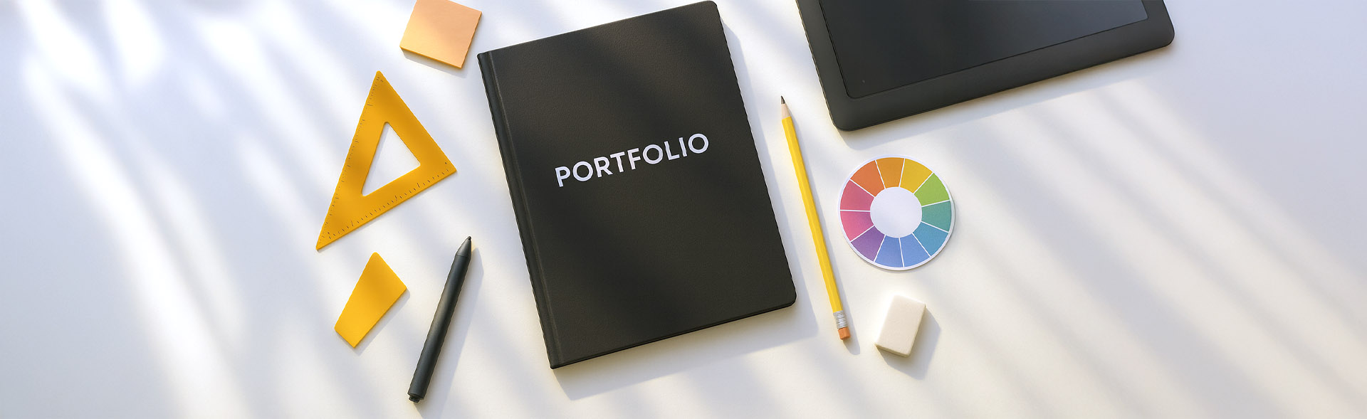 Graphic designer working on a desktop publishing project on computer