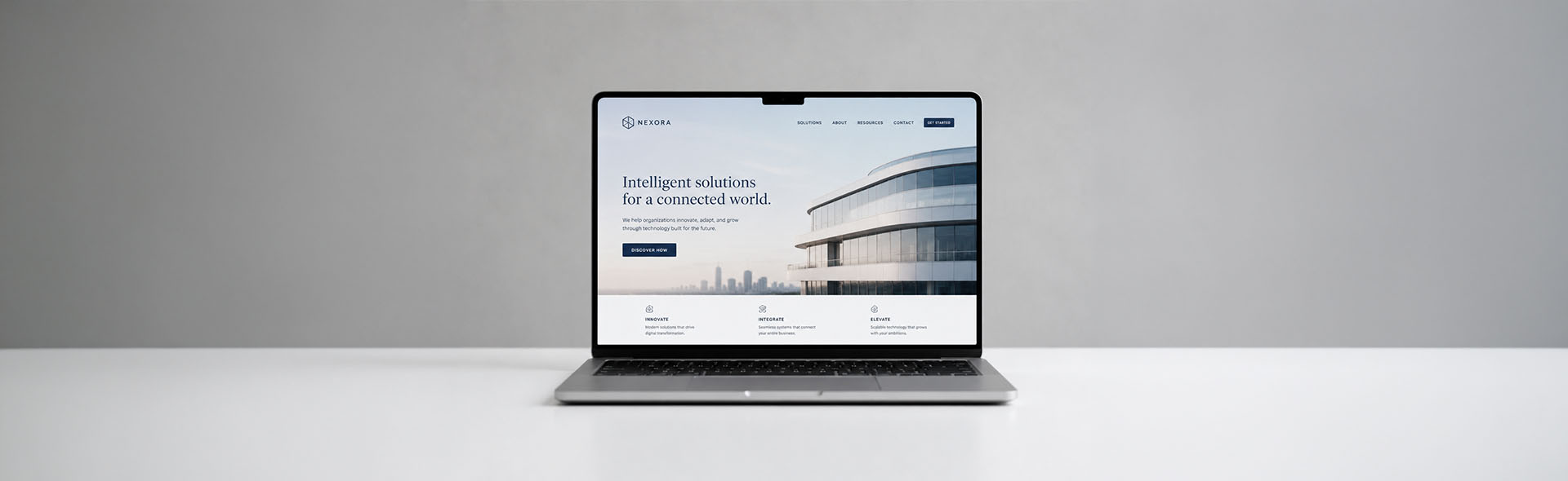 Laptop displaying a professionally designed website homepage — web design and development services in Webflow and WordPress