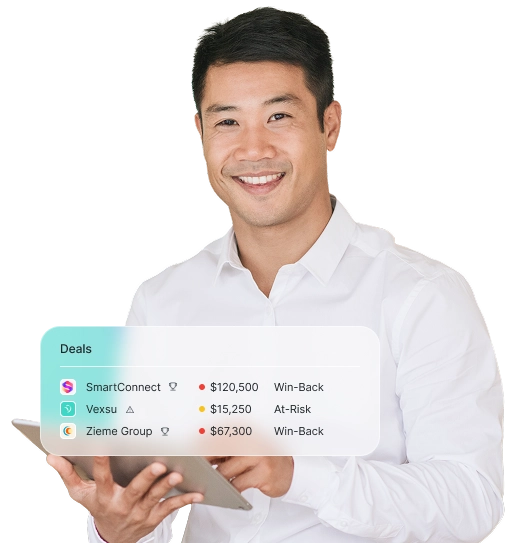 Smiling man in white shirt holding a tablet with a digital overlay showing deals: SmartConnect $120,500 Win-Back, Vexsu $15,250 At-Risk, and Zieme Group $67,300 Win-Back.