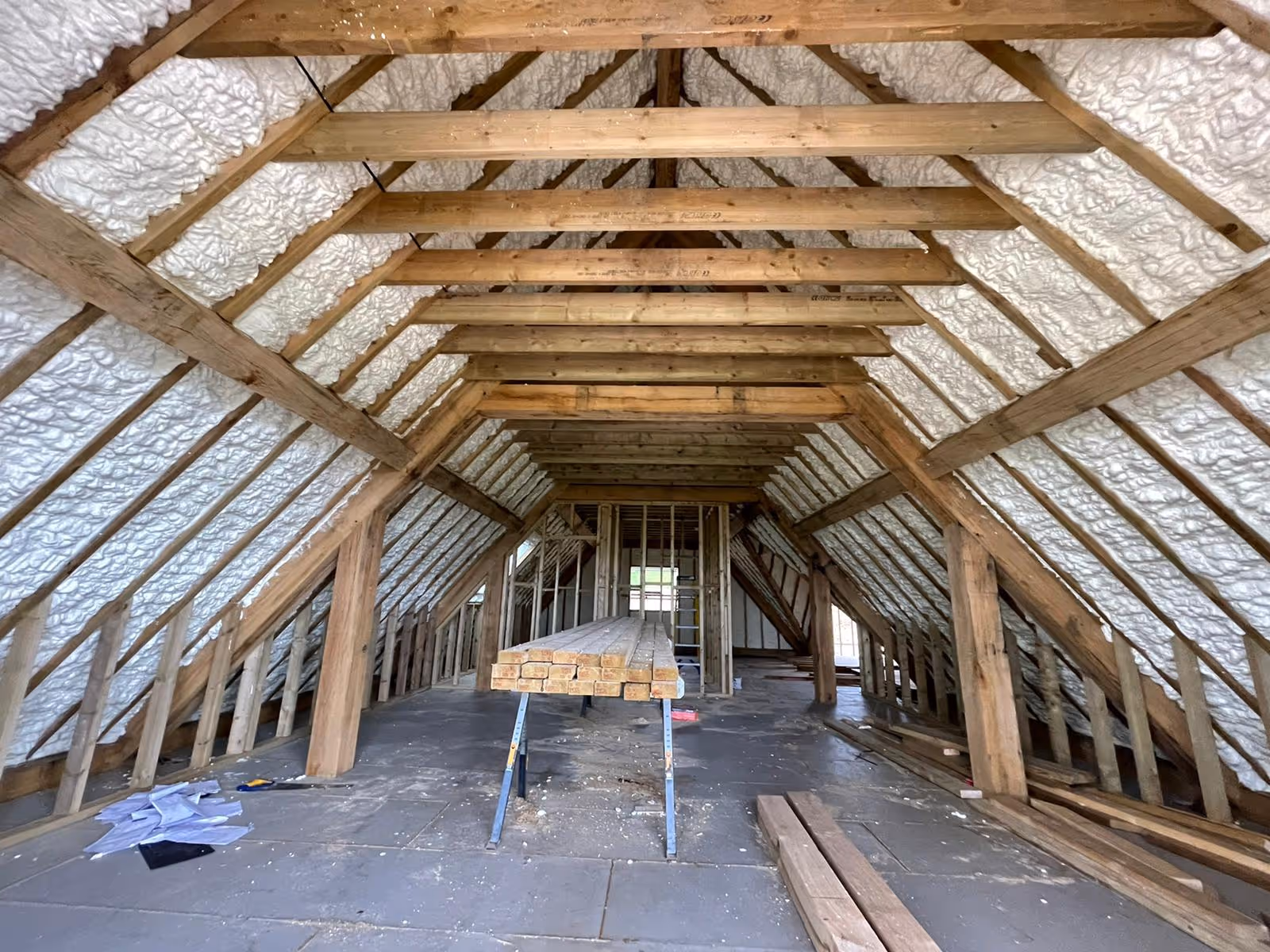 The inside of a barn conversion with foam insulated roof