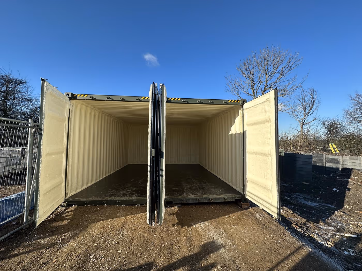 2 Containers side by side with doors open