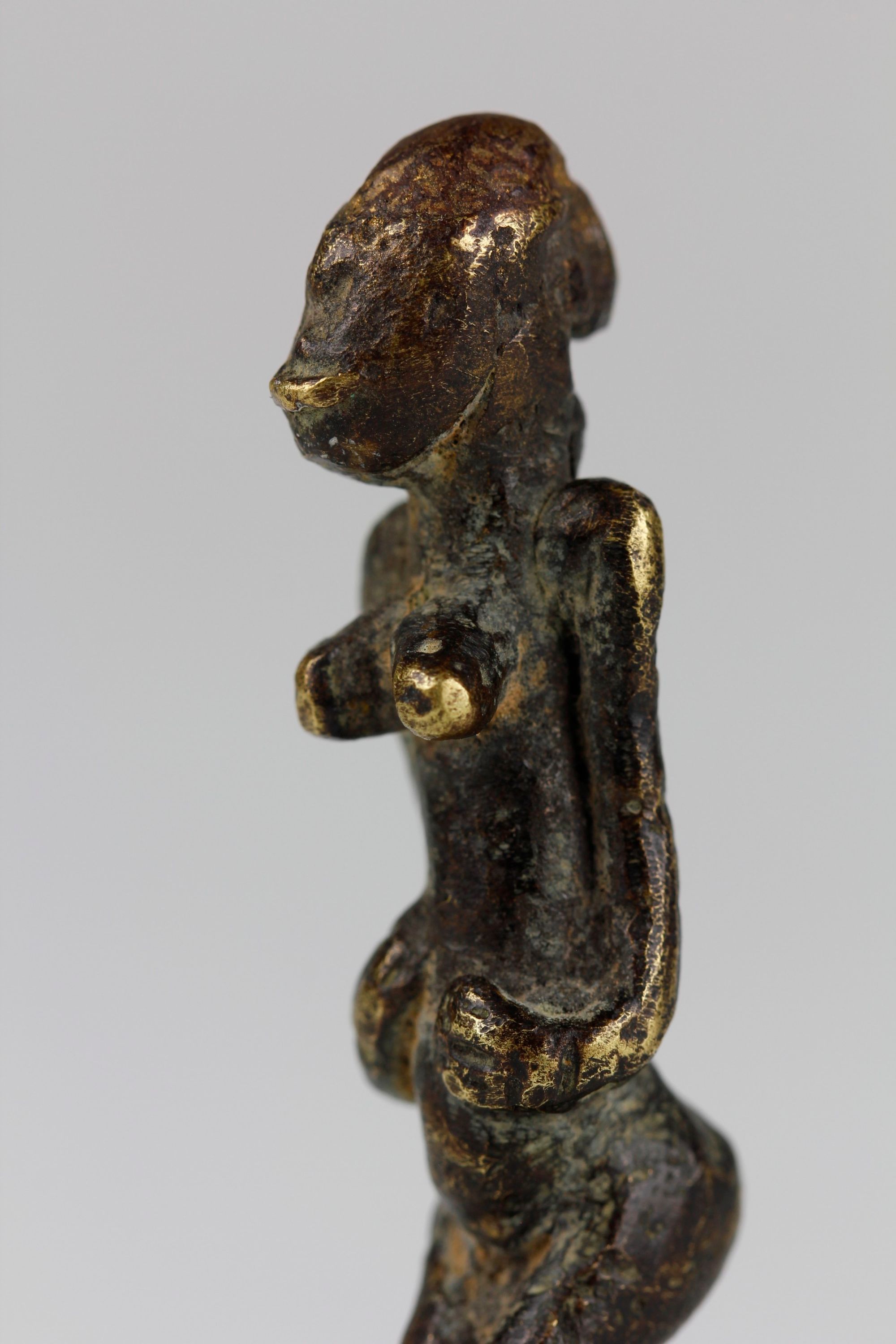 MINIATURE BRONZE FEMALE FIGURE. SENUFO?, IVORY COAST