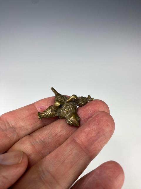 BRONZE WEIGHT OF TWO BIRDS WITH PRAY. AKAN, GHANA