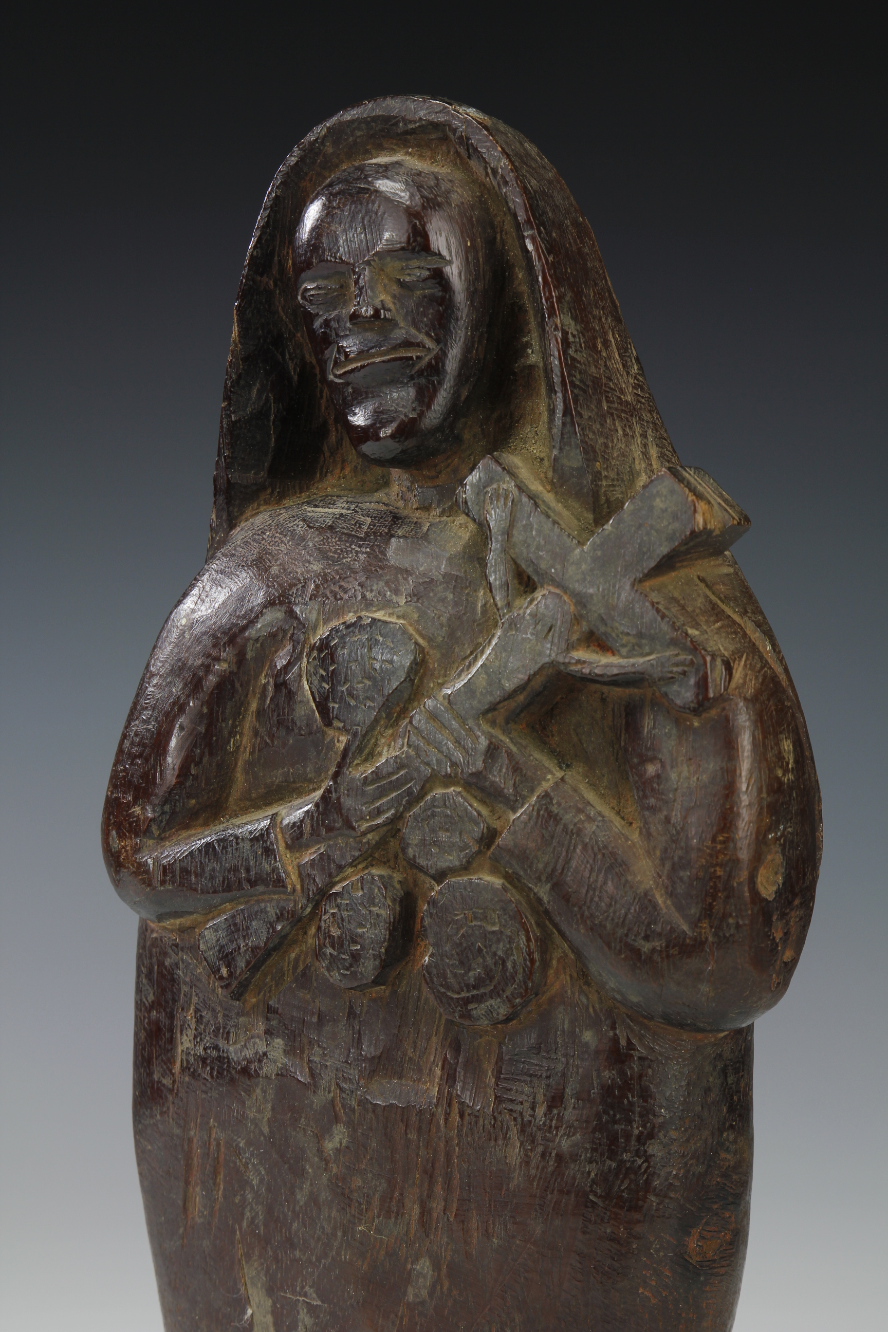 MADONNA HOLDING THE CROSS. MAKONDE, MOZAMBIQUE/TANZANIA