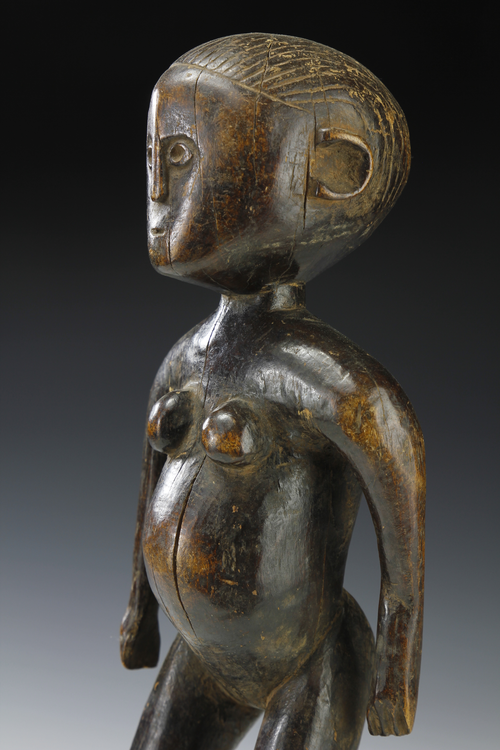 FINE FEMALE FIGURE WITH WONDERFUL MOVEMENT. FIPA, WESTERN TANZANIA