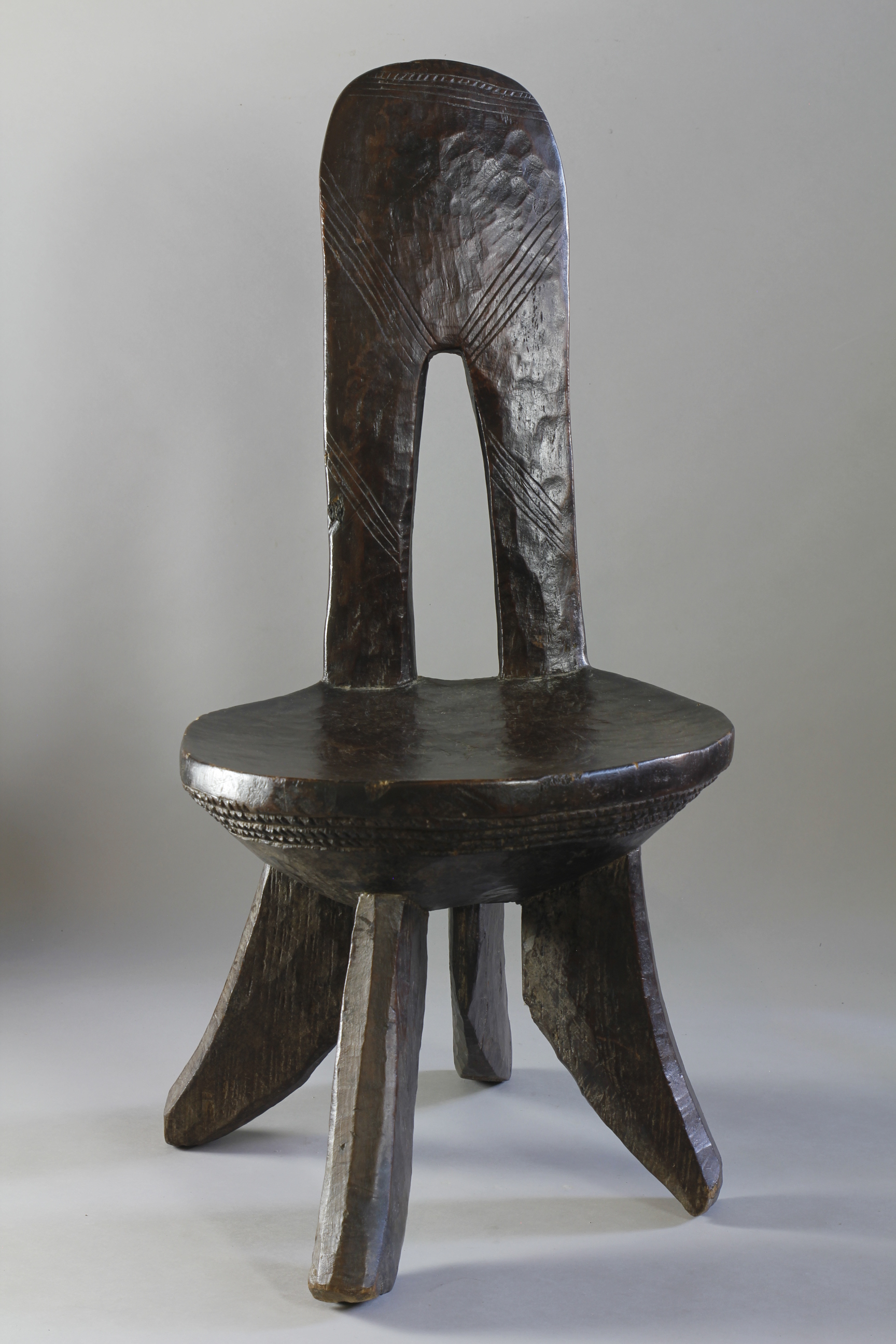 LARGE BEAUTIFULLY FORMED ETHIOPIAN HIGH BACKED CHAIR