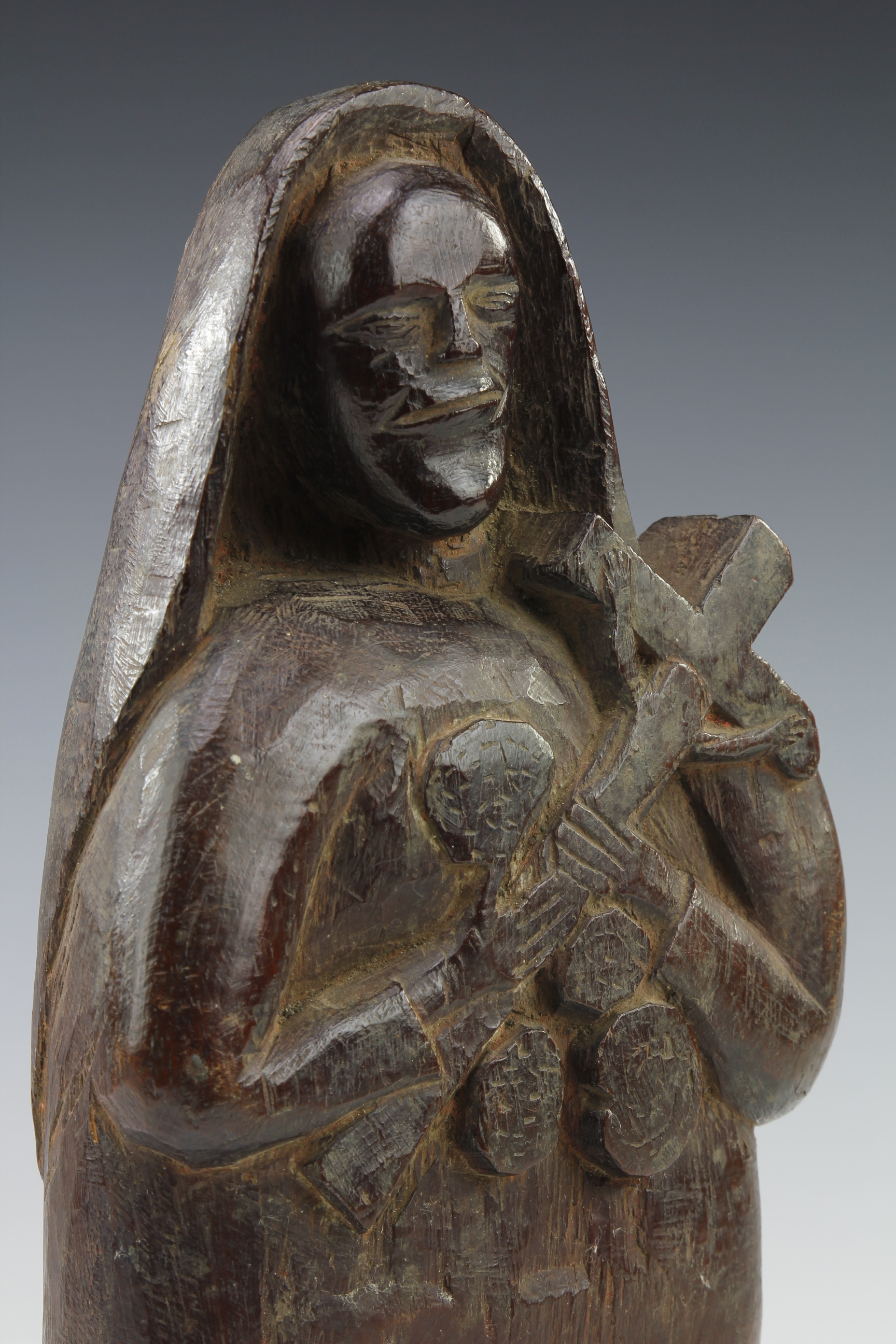 MADONNA HOLDING THE CROSS. MAKONDE, MOZAMBIQUE/TANZANIA