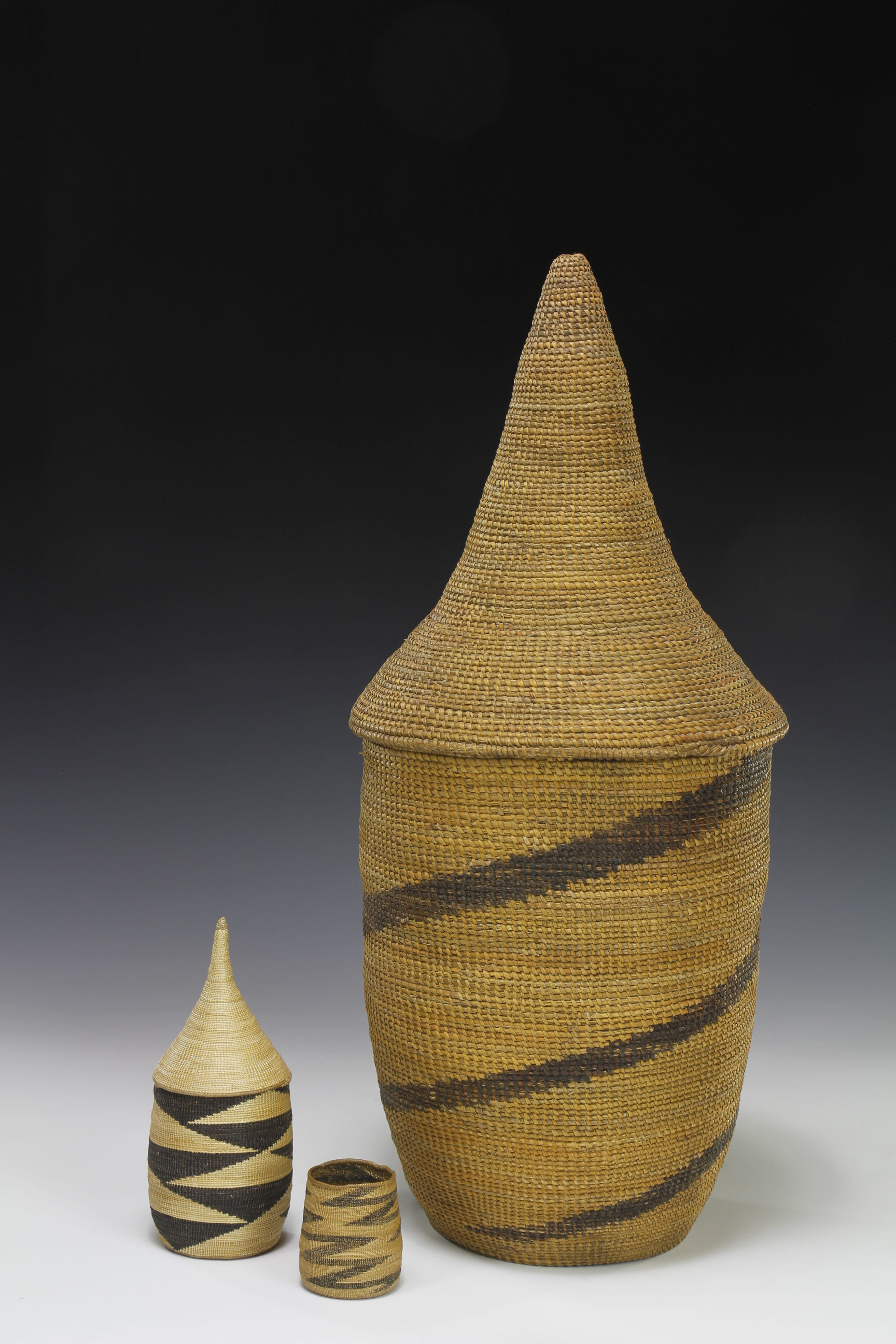 FINELY WOVEN GRASS FIBER BASKETS. TUTSI, BASKETS