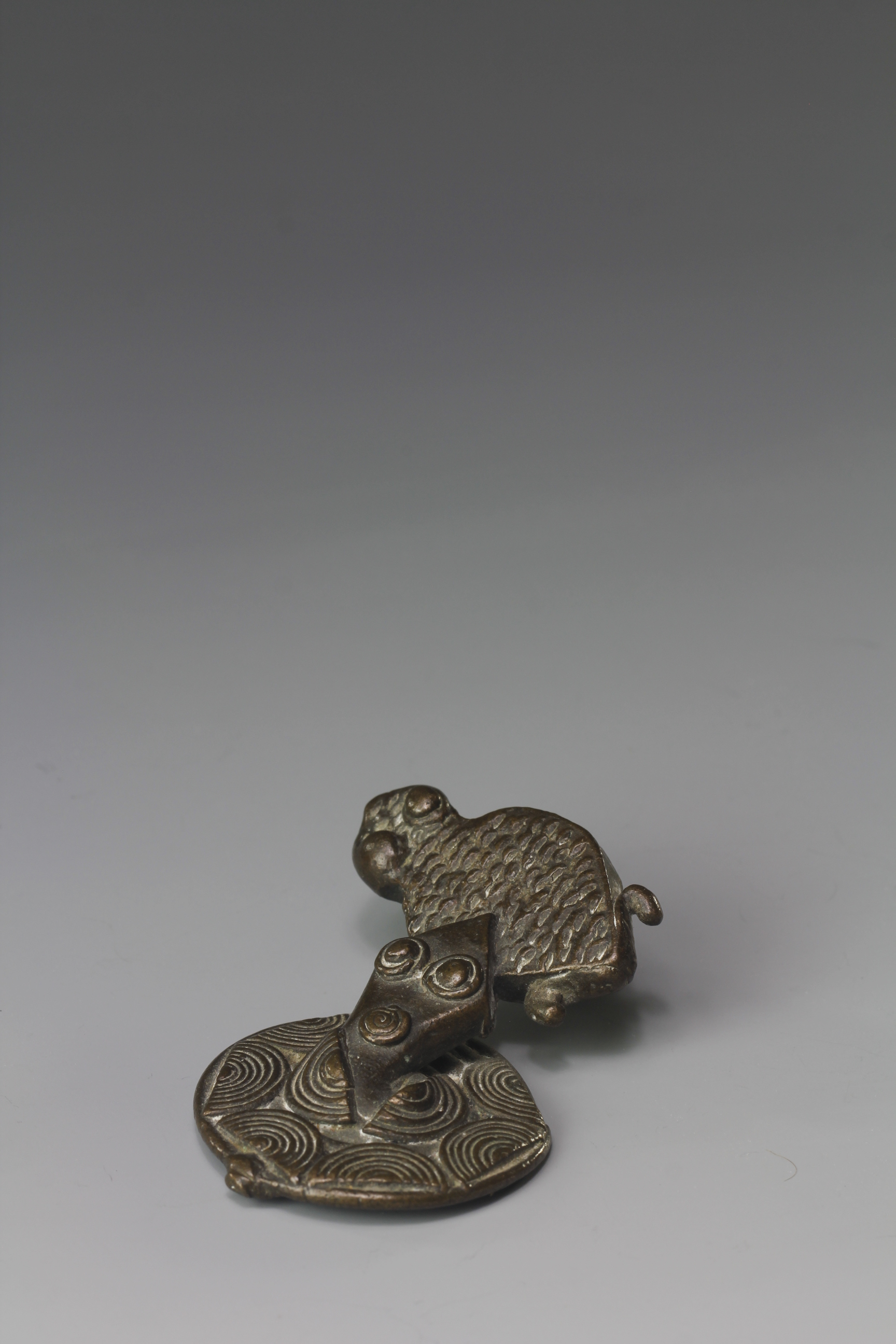 GOLD WEIGHT OF A SNAKE AND FROG. AKAN, GHANA