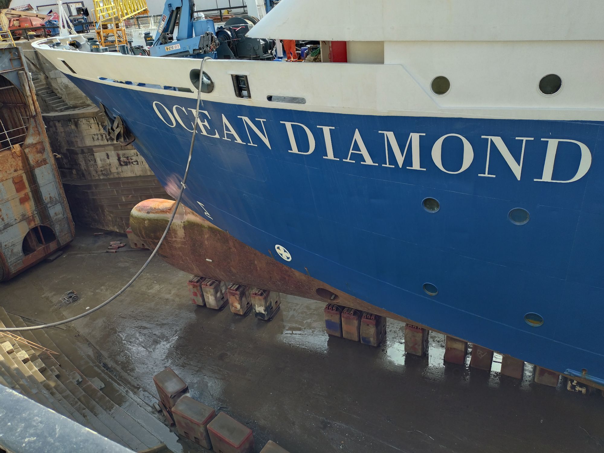 The vessel in dry dock still bearing her former name, Ocean Diamond, prior to conversion.
