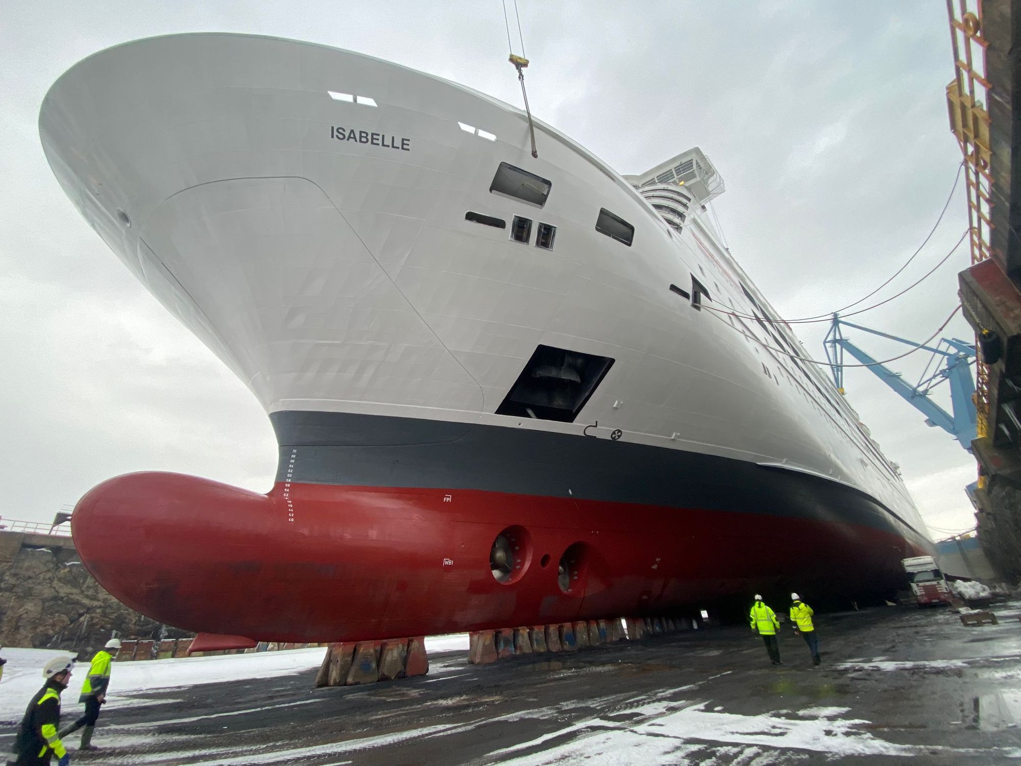 Isabelle X's stern in dry dock, rudder and propeller visible.