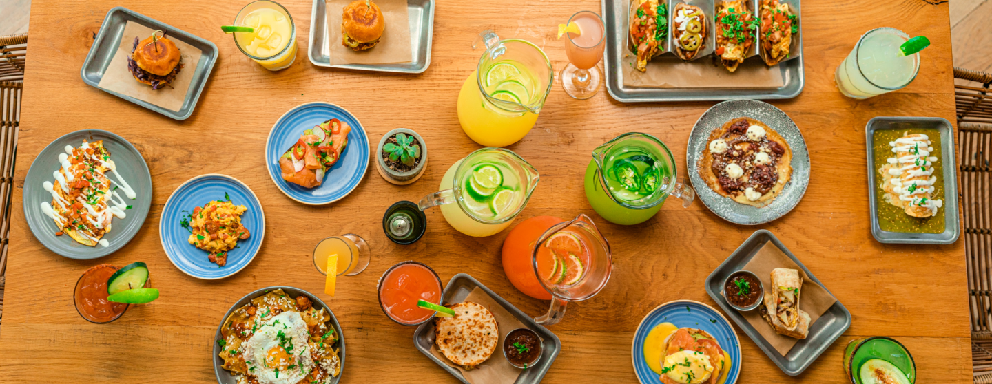 birds eye view of table with food and drinks