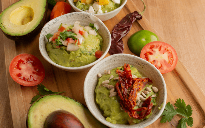 Guacamole with avocados and tomatoes 