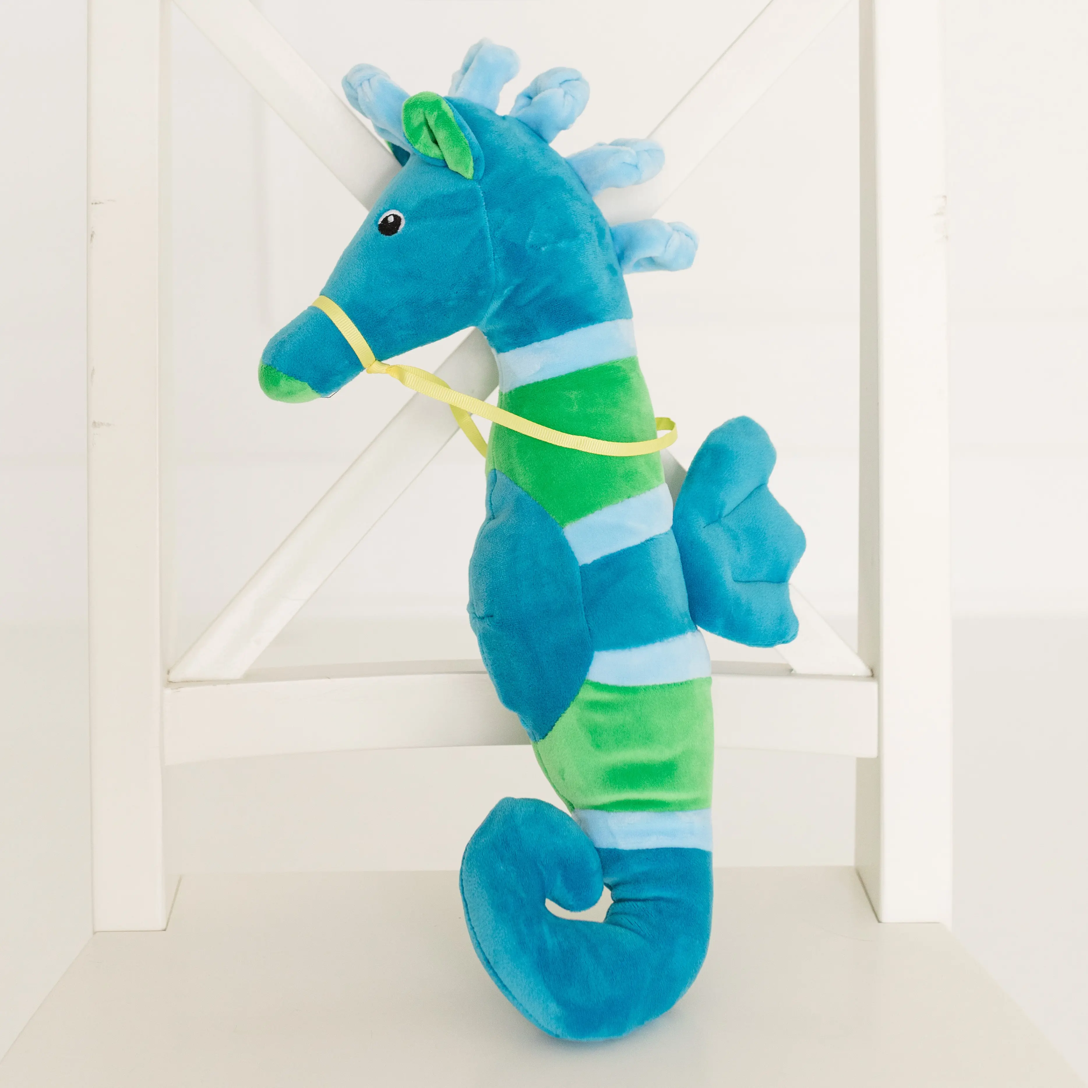 Meet Reef — the Cool Coastal Seahorse in Blue, Green & Yellow Splashed in refreshing shades of blue, green, and sunny yellow, this soft and squishy seahorse brings a breezy wave of ocean charm wherever you go. Reef’s playful colors and gentle expression make them the perfect calming companion—whether you’re lounging by the water or snuggled up far from the shore. From tropical coastlines to cozy cabins, Reef carries the spirit of the sea with them, ready to brighten your day and spark a sense of seaside wonder no matter where you call home.