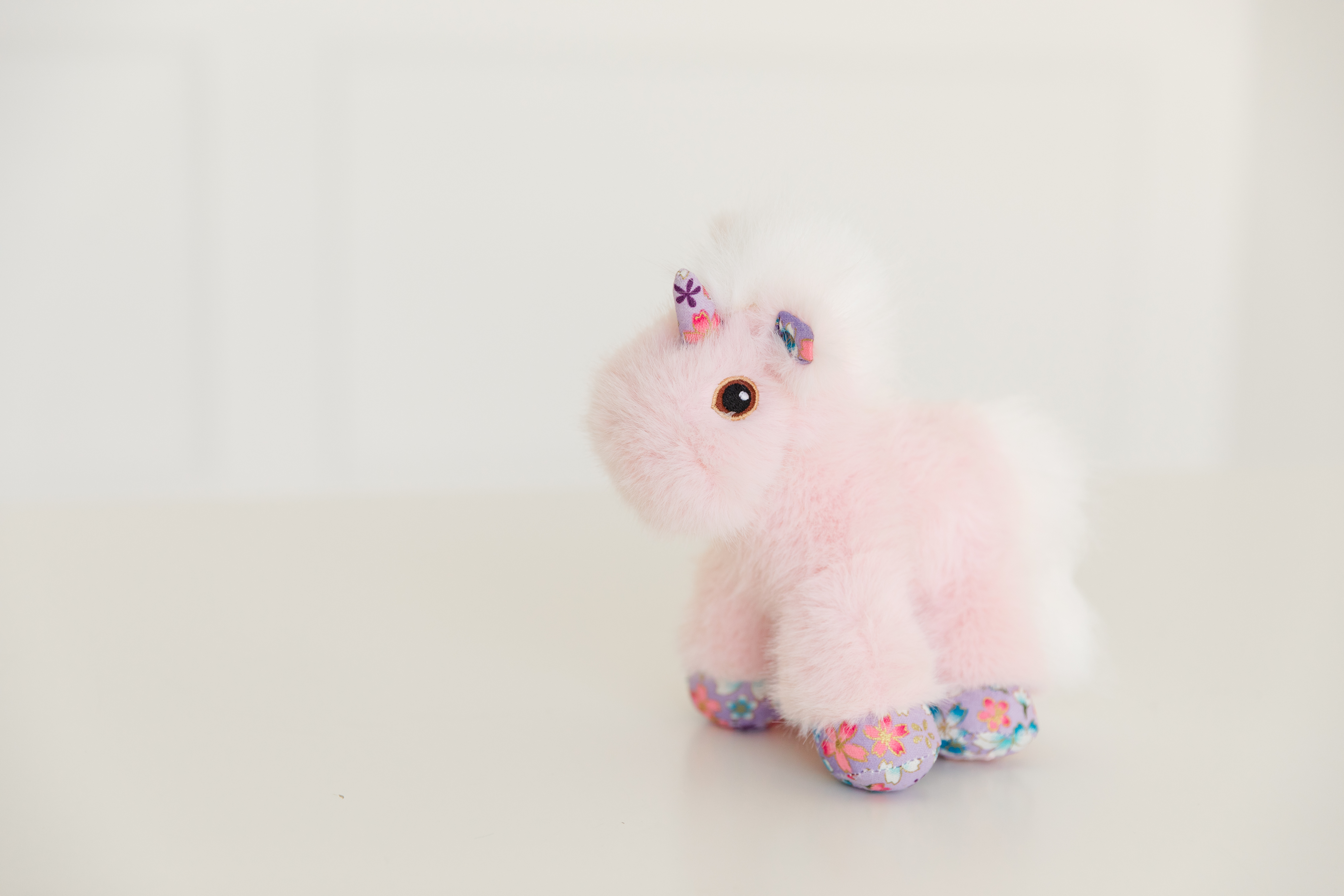 Little Therese is our exclusive flower-covered mini unicorn—snuggly, sweet, and made for hopes, dreams, wishes, and a little magic.