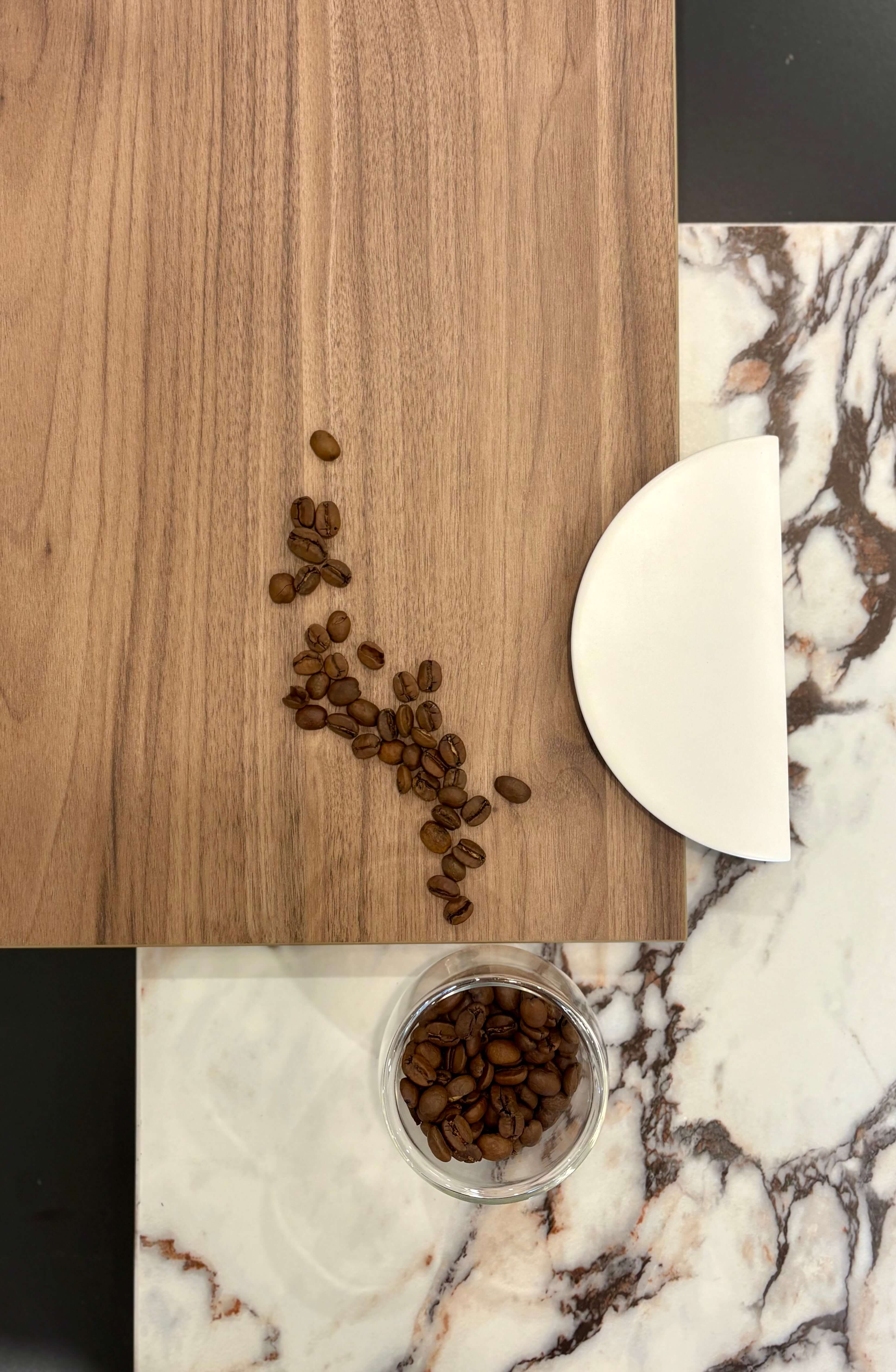 Calacatta stone surface with walnut cabinetry for a warm contemporary look
