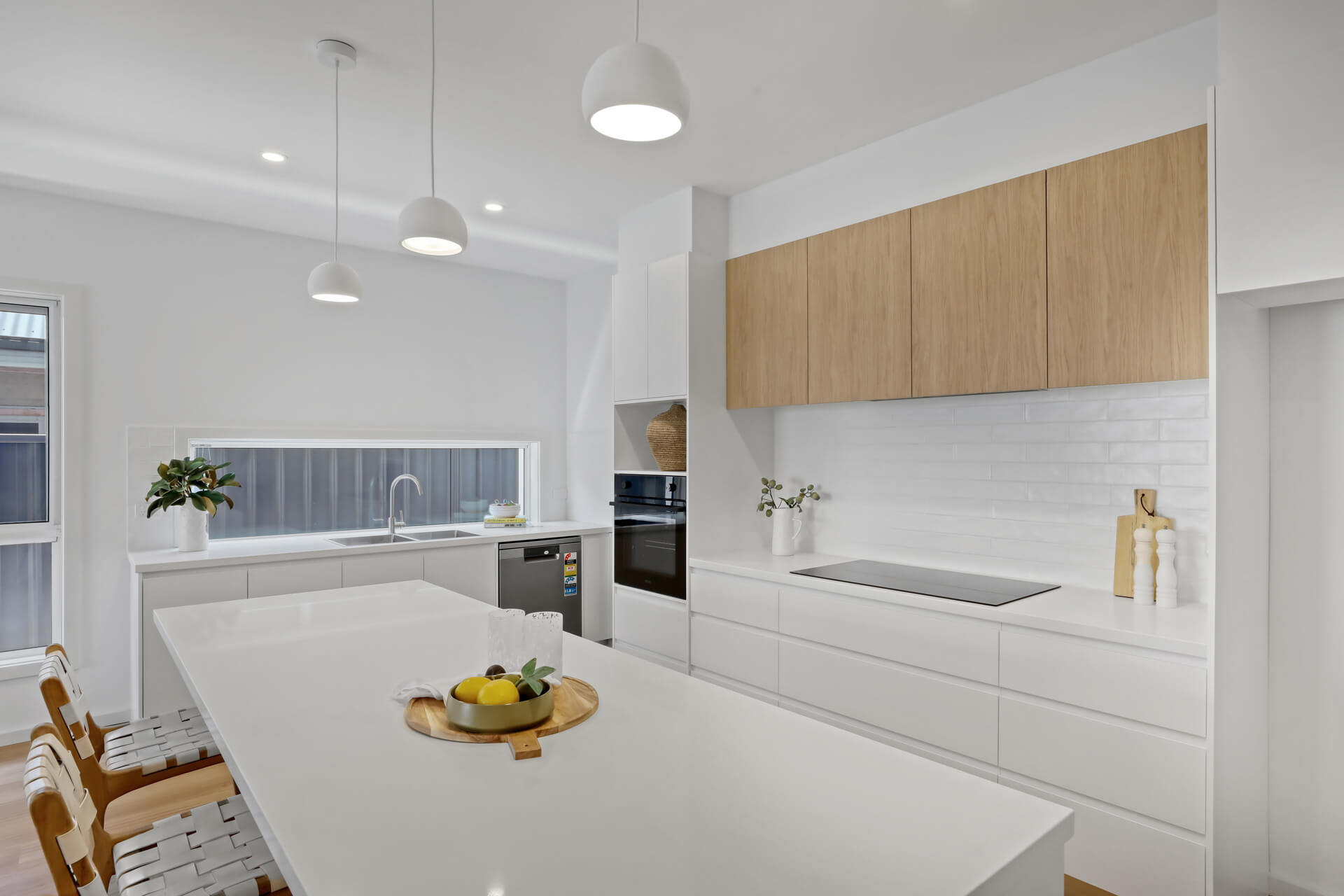 Contemporary kitchen featuring custom joinery and functional layout