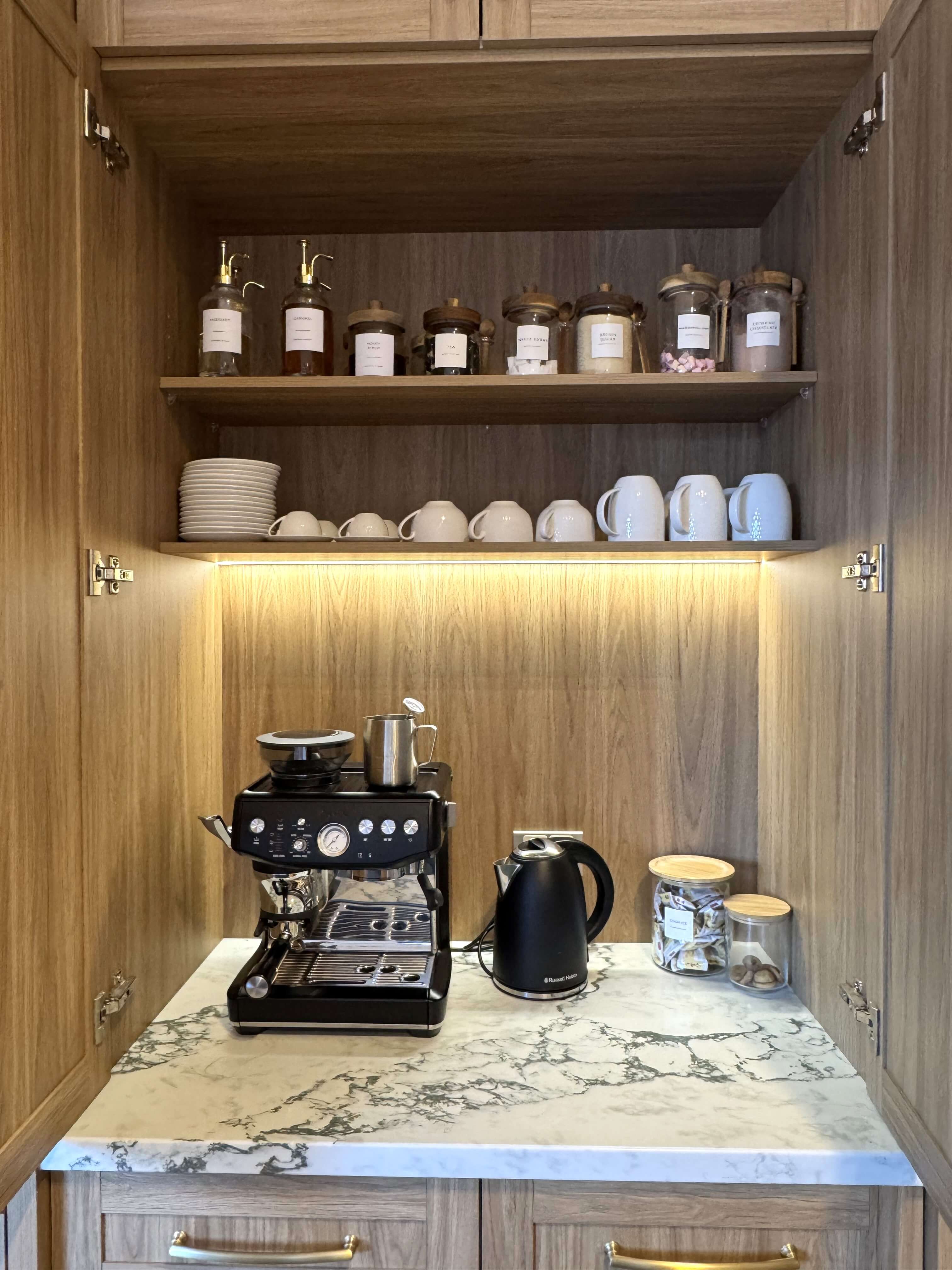 Contemporary kitchen space with sleek cabinetry and layout