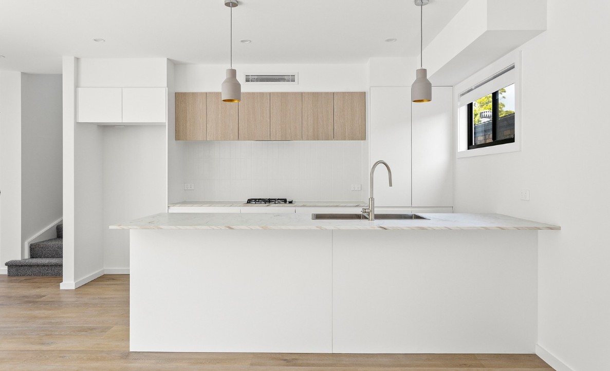 Contemporary kitchen in Oak Flats with custom joinery and open plan design