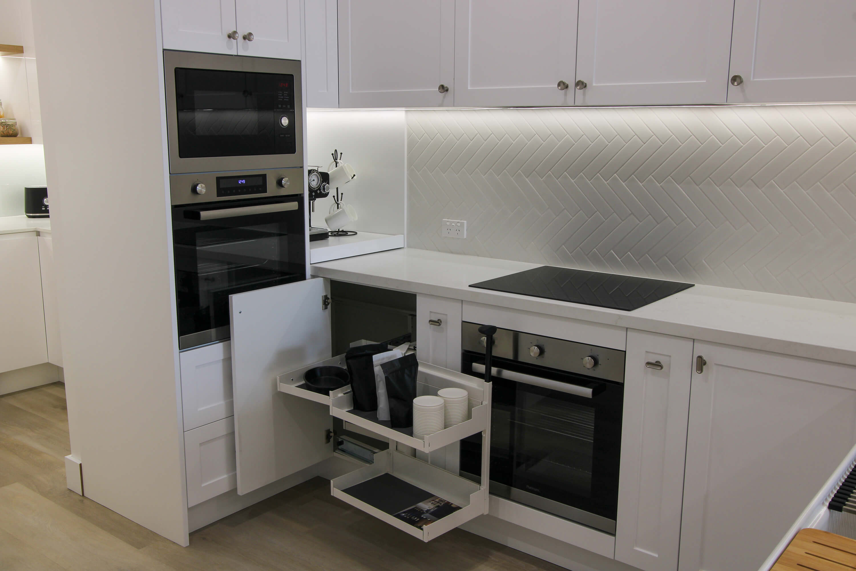 Kitchen showroom showcasing cabinetry and benchtop options