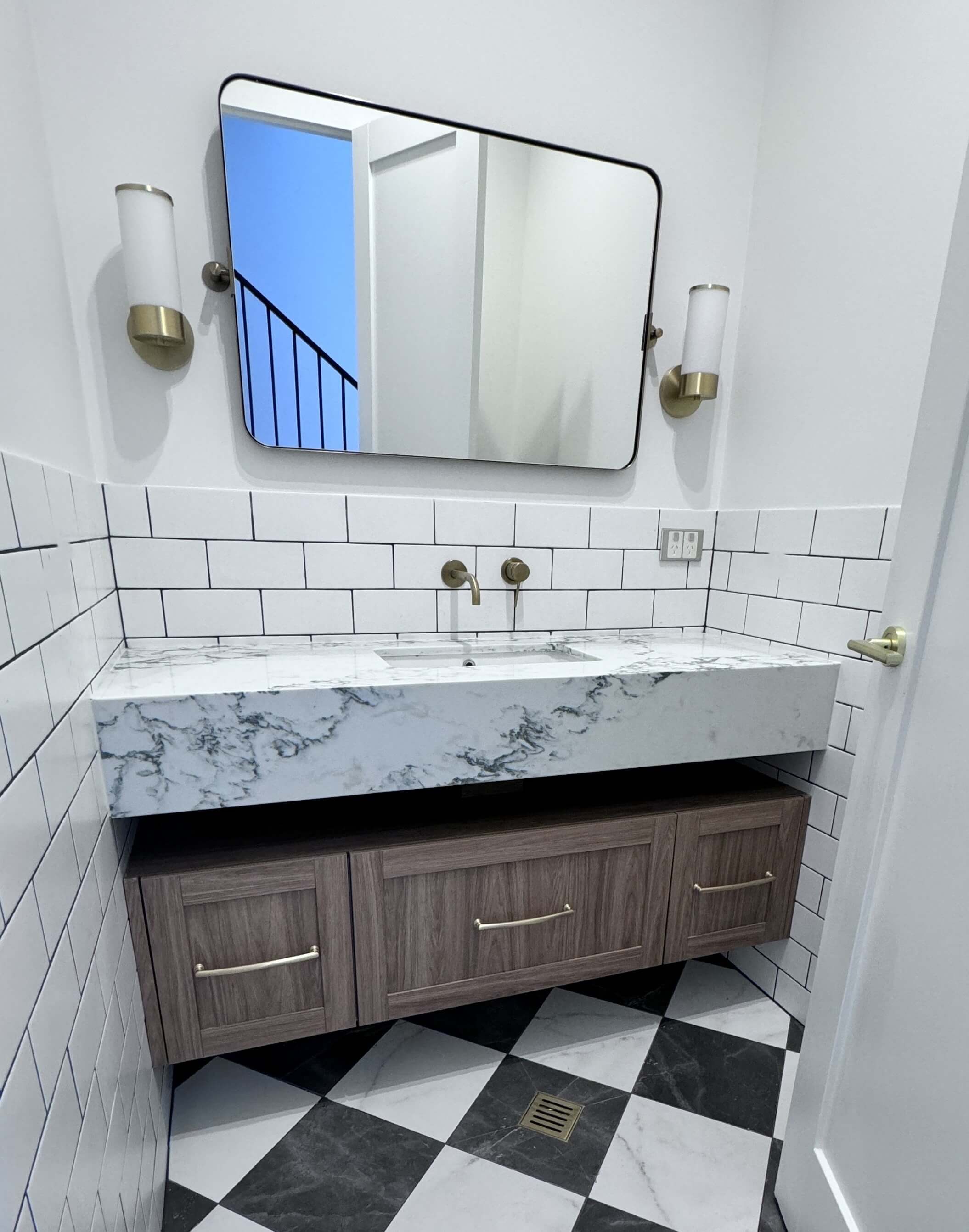 Custom vanity cabinetry with sleek modern finish