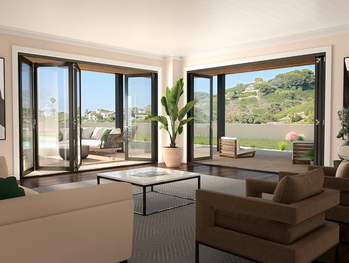 Image of Milgard's AX550 Bi-Fold Glass Wall Opening a Living Room to a Backyard Lounge