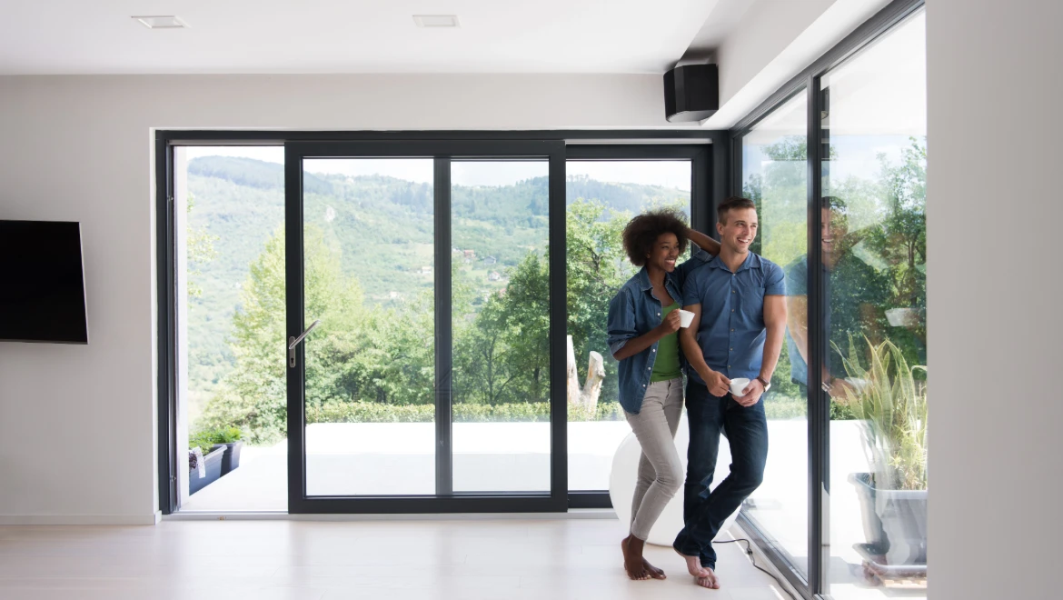 Image of a couple enjoying their new sliding door system