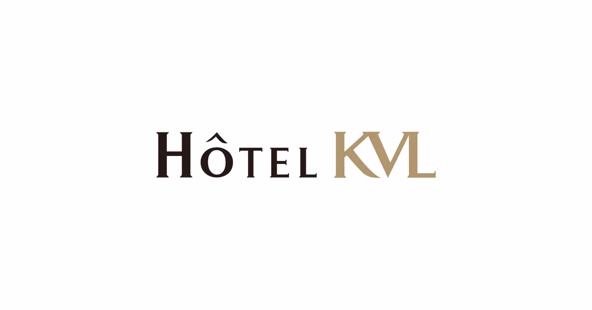 The logo for Hôtel KVL with Hôtel in black and KVL in gold text on white background.