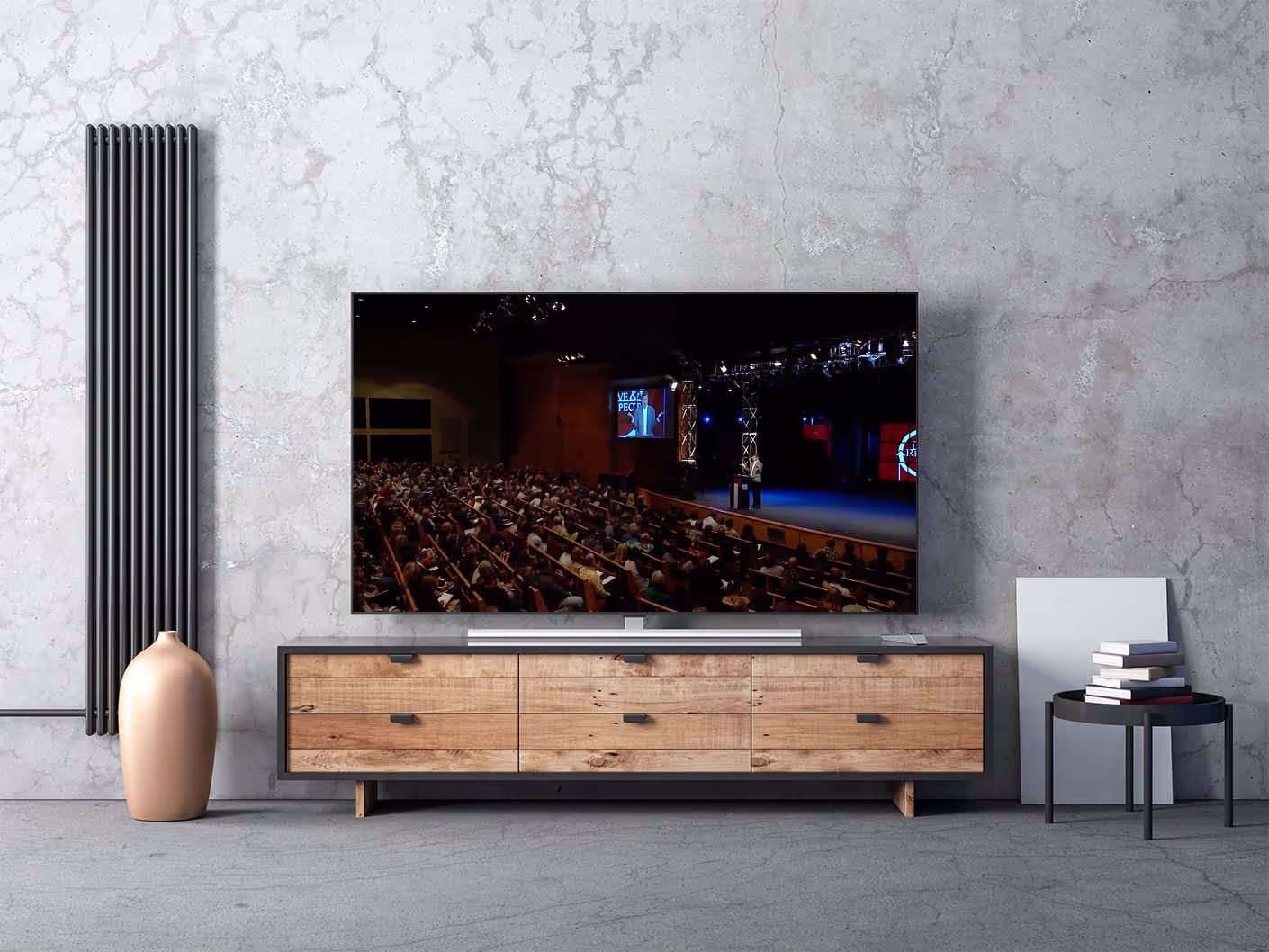 modern living room setting with big flat screen tv playing online marriage course with emerson eggerichs phd on the screen