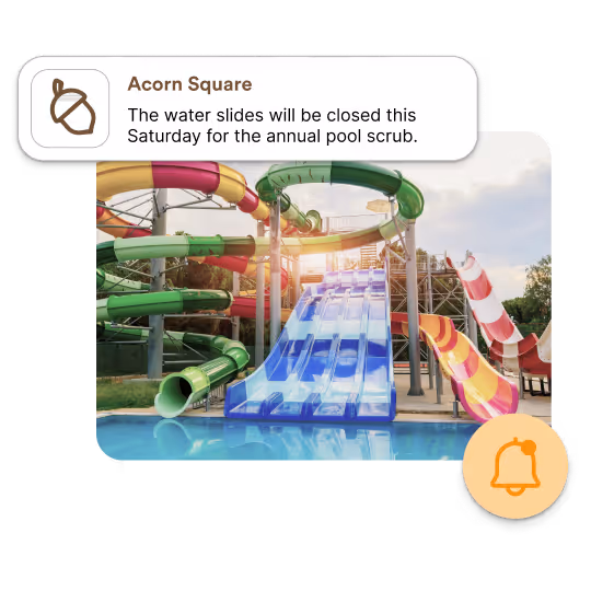 Colorful water slides at a water park with a notice about temporary closure for cleaning.