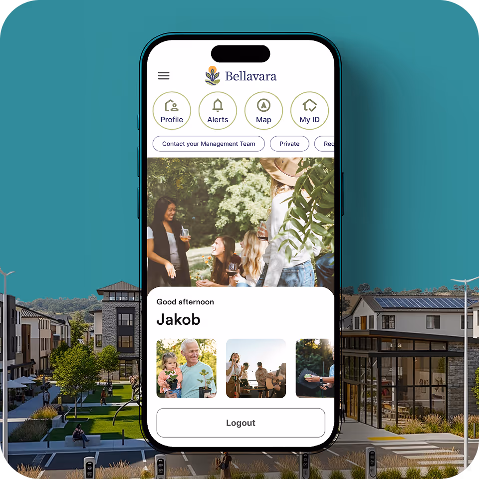 Mobile phone displaying a residential community app with user login and amenities