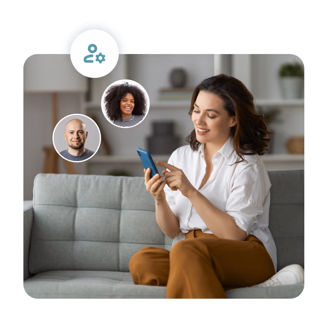 Woman sitting on couch smiling at her phone with profile icons floating nearby in app interface.