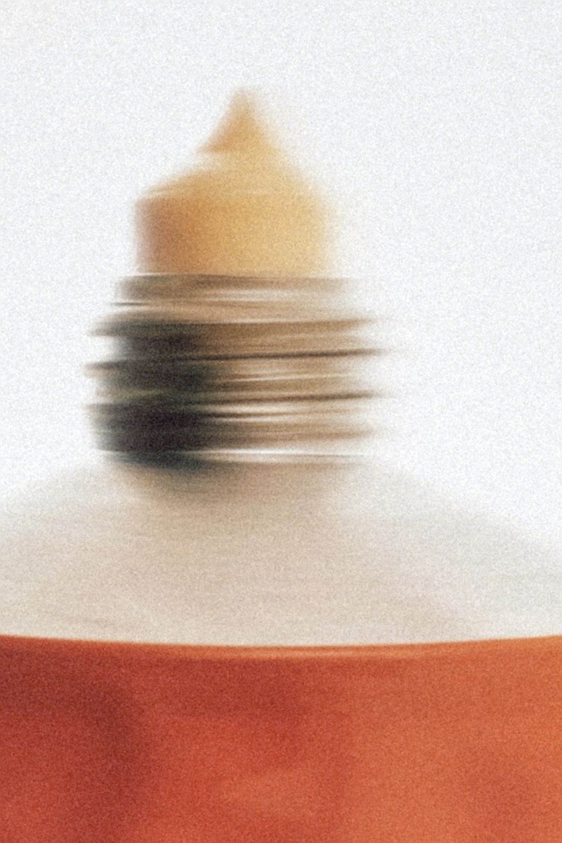 A tube of hair colour, softly out of focus