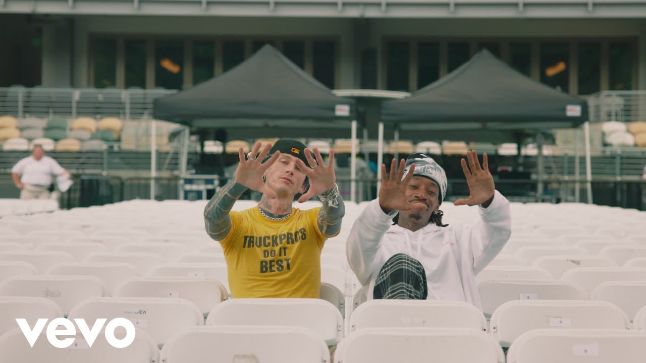Watch the music video for "Passport" by Wiz Khalifa and MGK