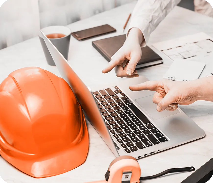 Construction project planning on laptop