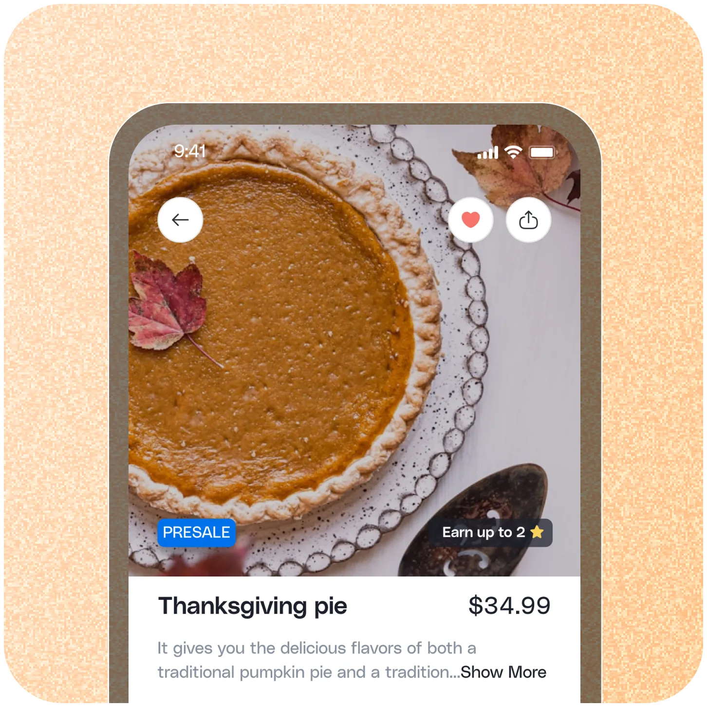 Top-down view of a pumpkin Thanksgiving pie on a decorative plate with autumn leaves beside it.