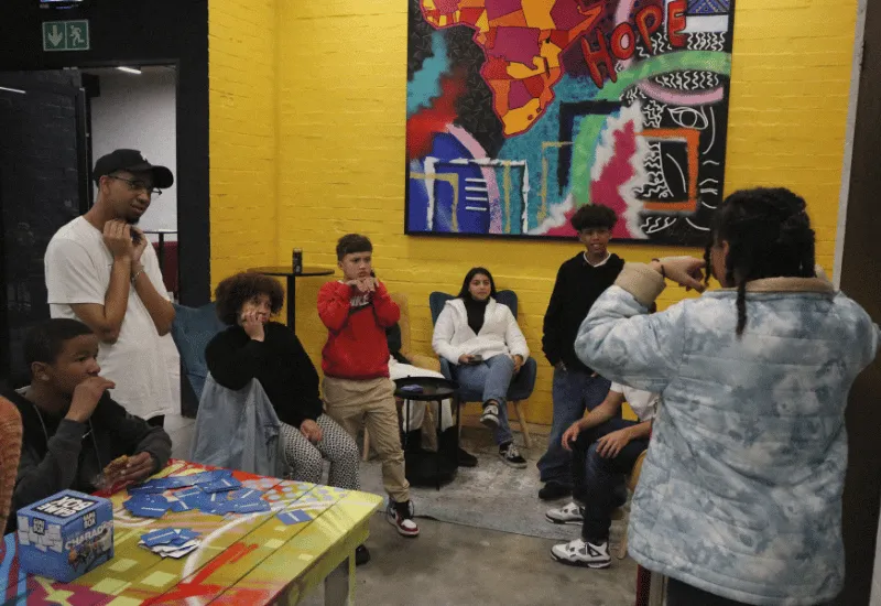A group of youth having fun playing games at the youth gatherings.
