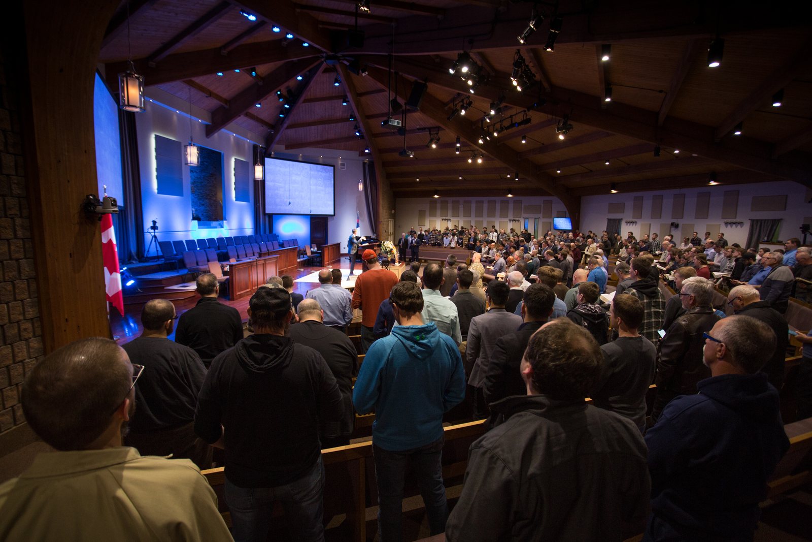 A full auditorium of men